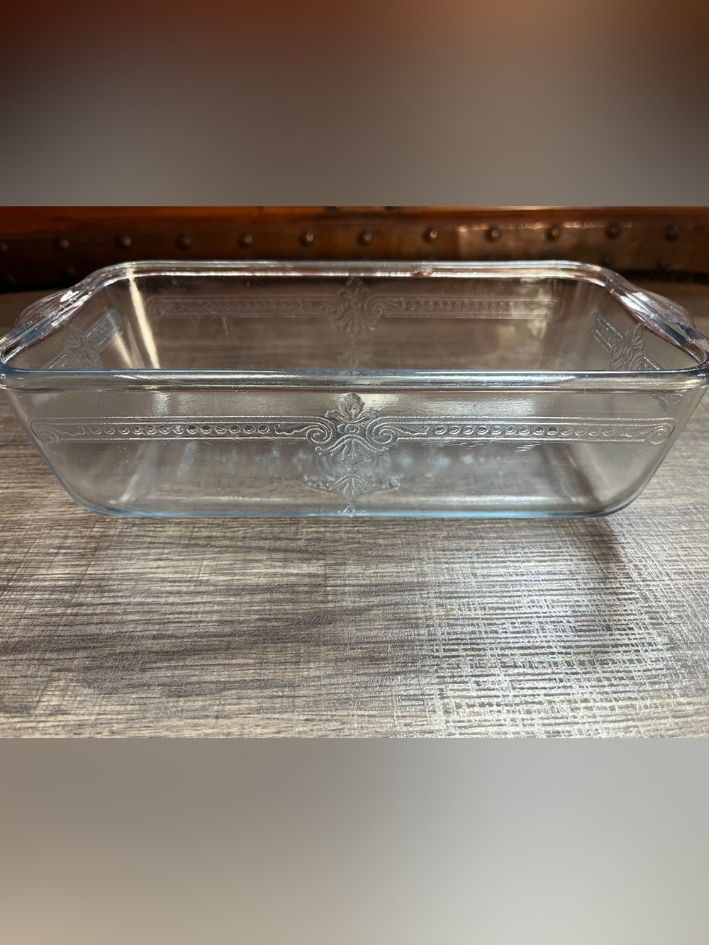 Beautiful Fire King loaf pan. Decorative. Chip on outside and rim. See photos